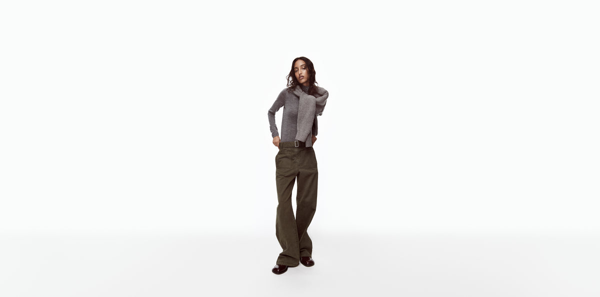 Gap × Victoria Beckham: Grey knit with green trousers