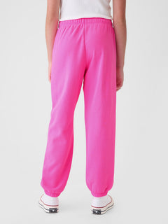 Gap Kids VintageSoft Logo Joggers in Standout pink, front view on a model