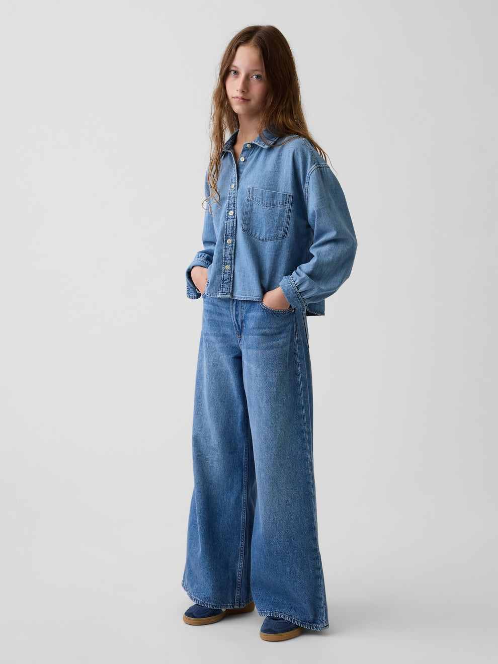 Gap Kids Low Rise Baggy Jeans in medium wash, full-length view on a model