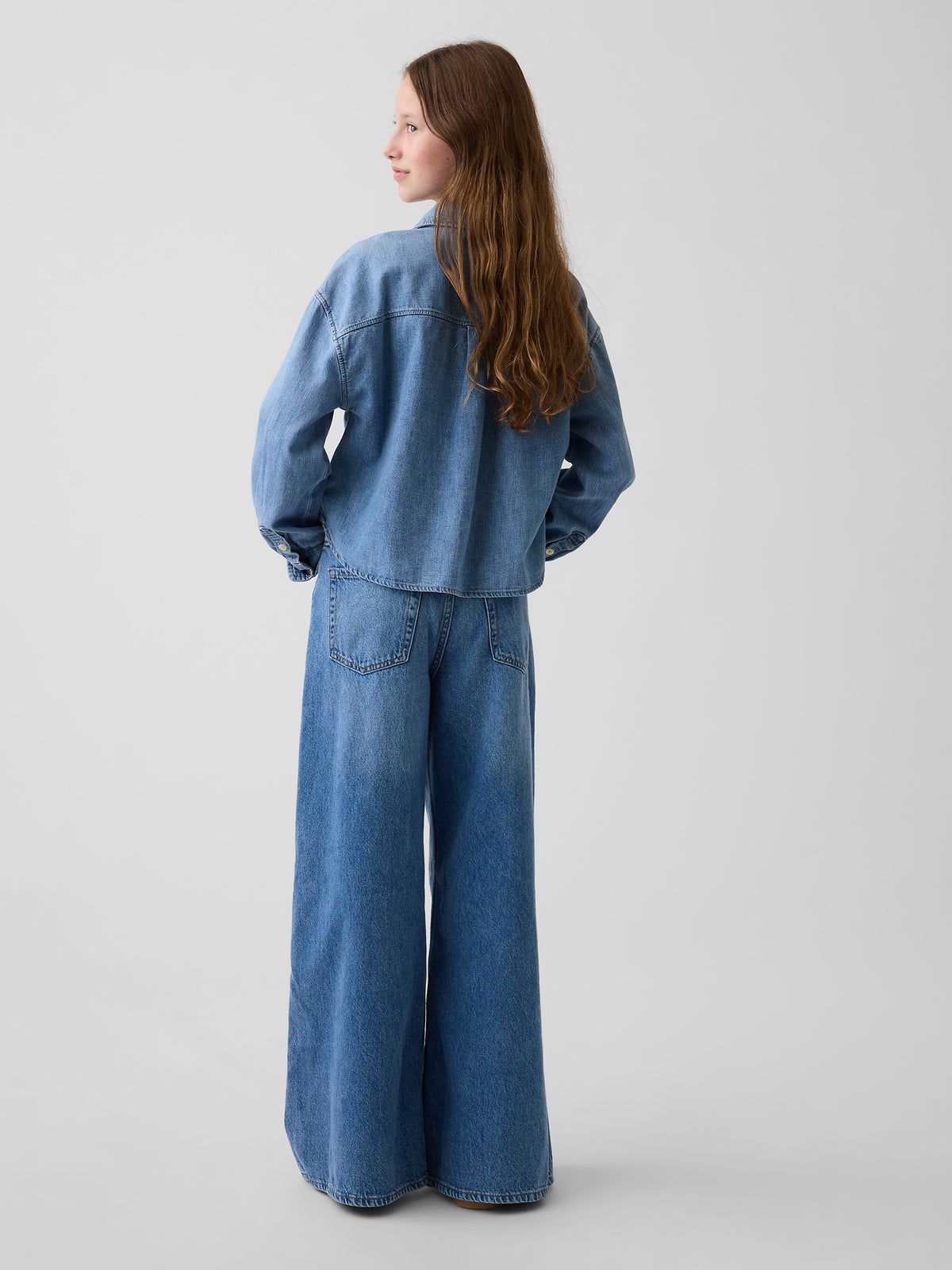 Gap Kids Low Rise Baggy Jeans in medium wash, back view on a model