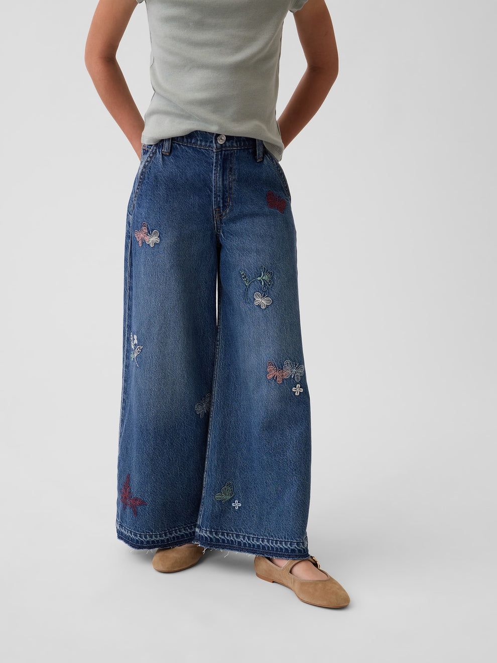 Gap Kids Low Rise Embroidered Baggy Jeans in Medium wash embroidery, front view on a child model