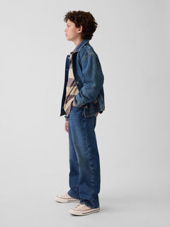 Gap Kids '90s Loose Jeans in Dark wash, side view on a child model