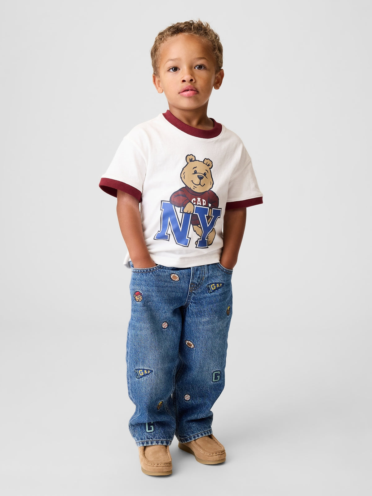 Gap Baby & Toddler Embroidered Pull-On Baggy Jeans in Medium wash embroidered, full-length view on a child model