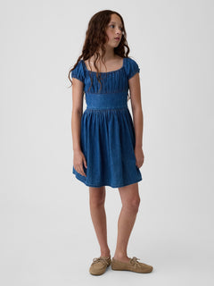 Gap Kids Denim Puff-Sleeve Dress in Medium wash, front view on a child model