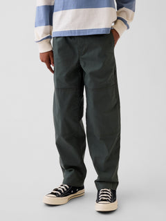 Gap Kids Double-Knee Quick-Dry Pants in Green rapids, front view on a child model