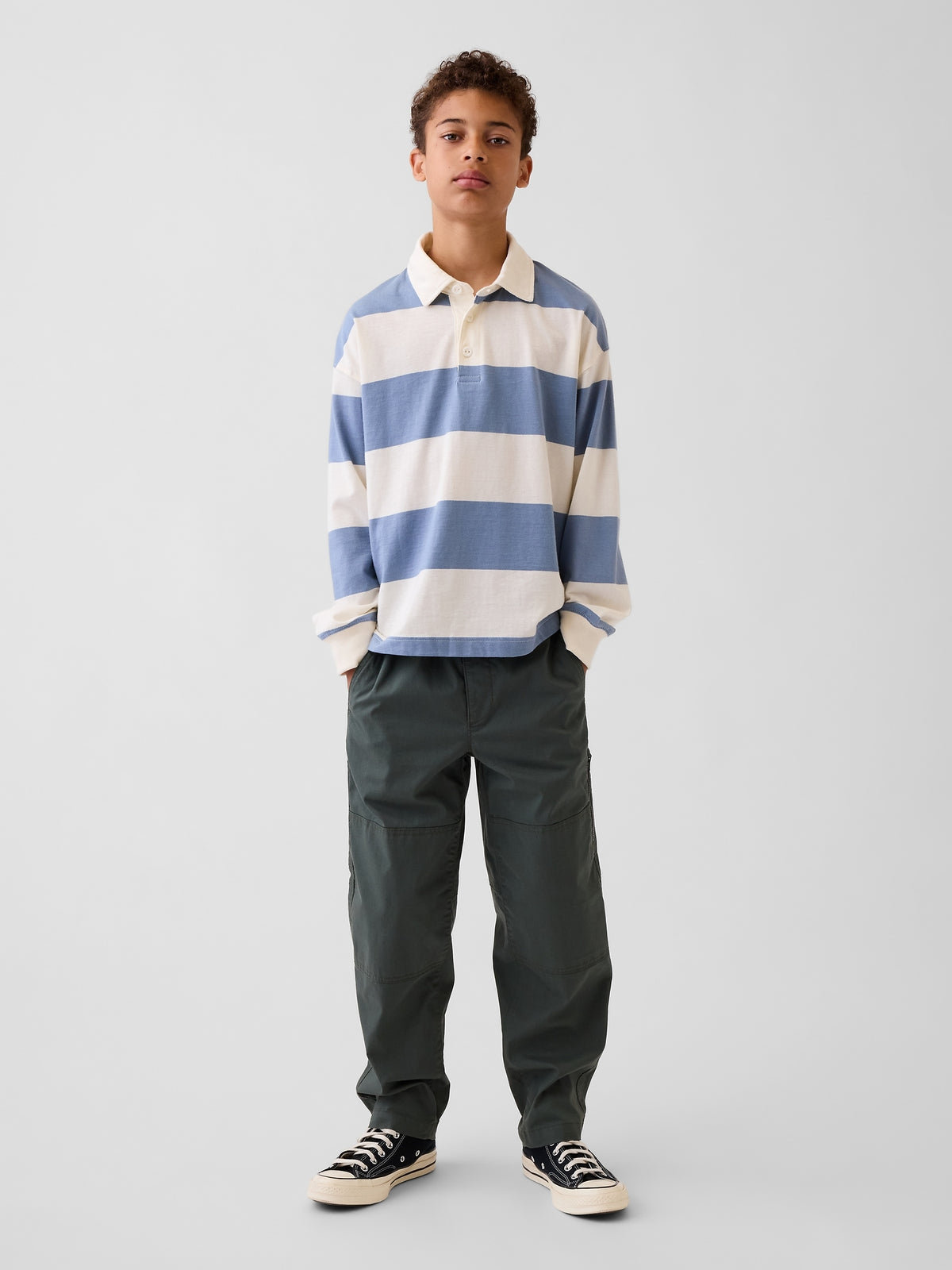 Gap Kids Double-Knee Quick-Dry Pants in Green rapids, full-length view on a child model
