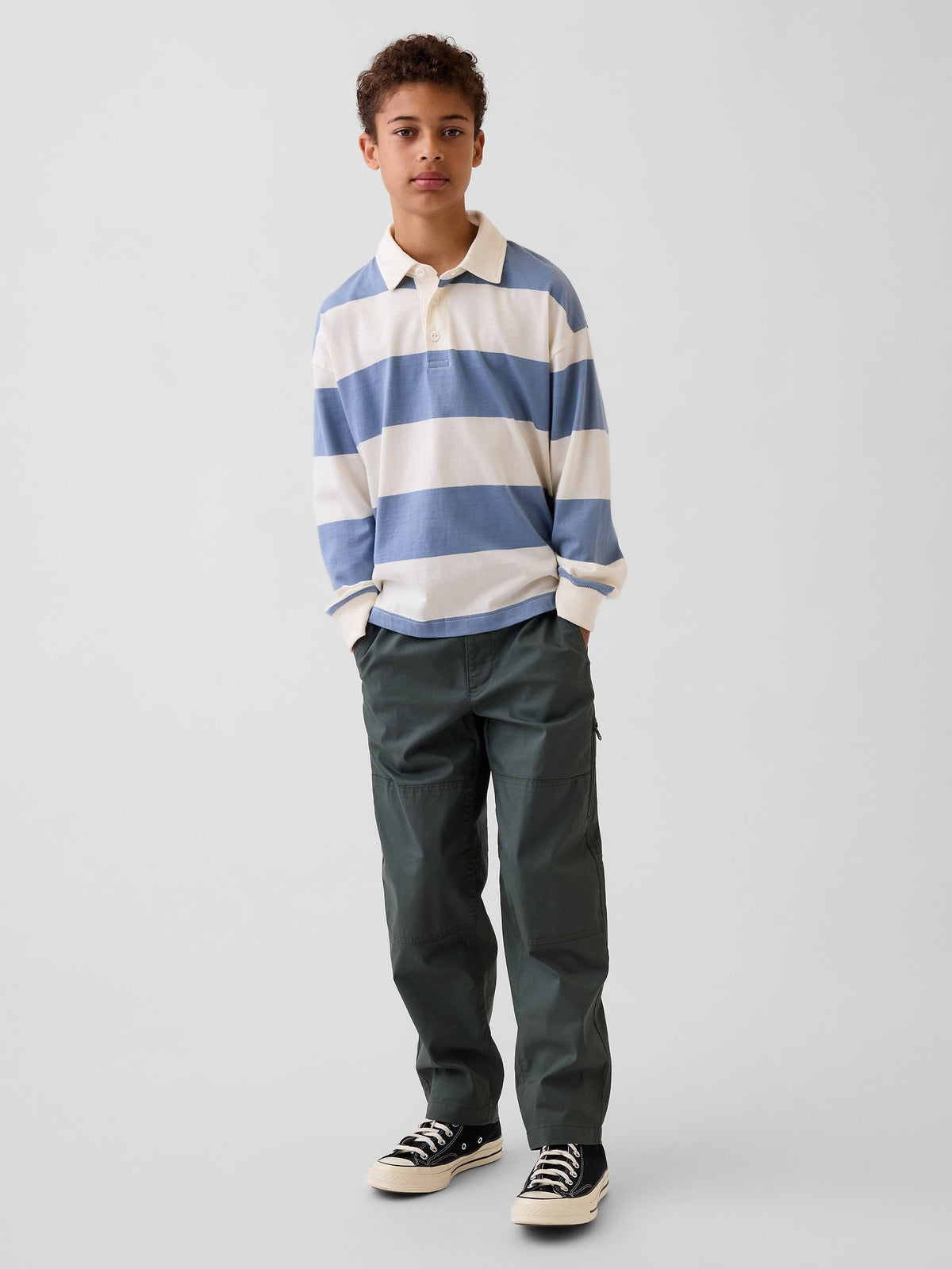 Gap Kids Double-Knee Quick-Dry Pants in Green rapids, full-length view on a child model