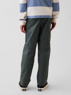Gap Kids Double-Knee Quick-Dry Pants in Green rapids, back view on a child model