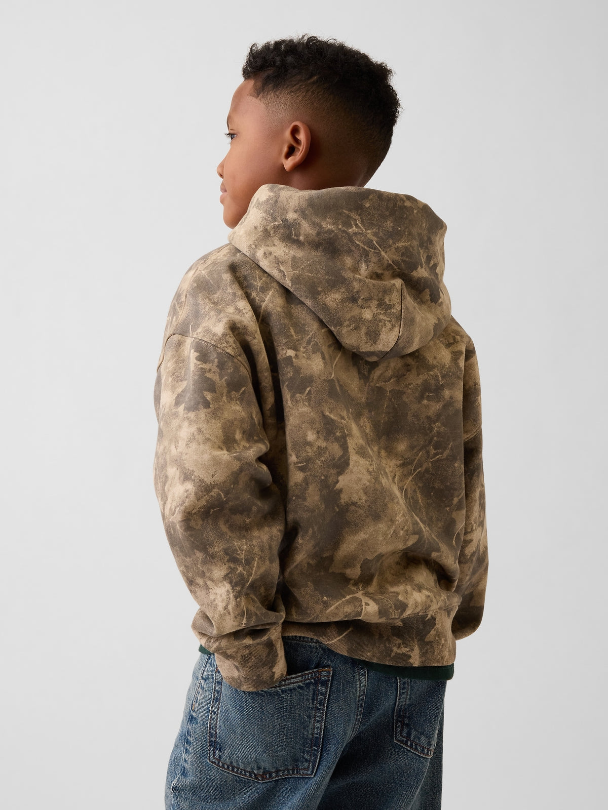 Gap Kids VintageSoft Relaxed Hoodie in Light camo, back view on a child model