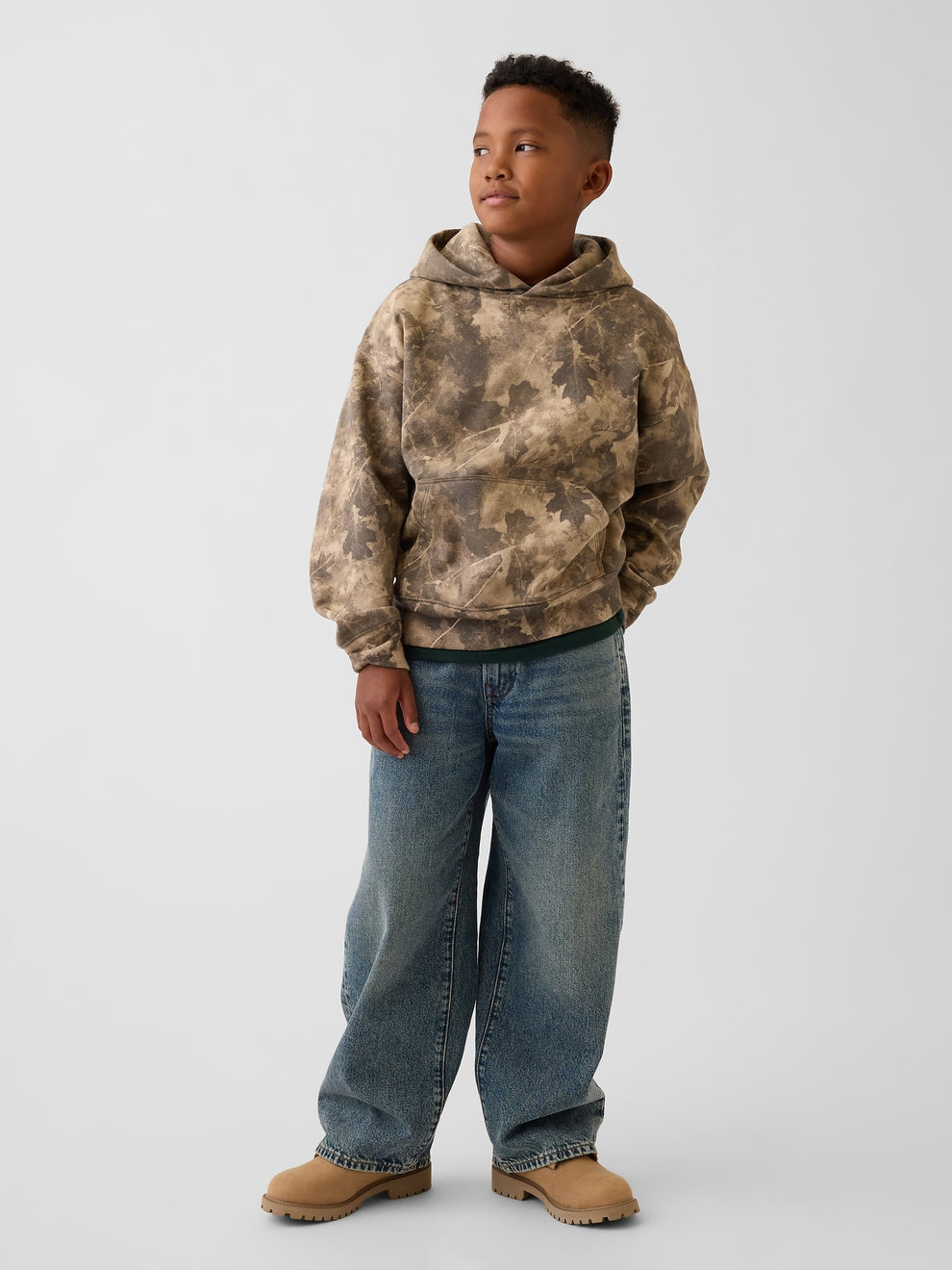 Gap Kids VintageSoft Relaxed Hoodie in Light camo, full-length view on a child model
