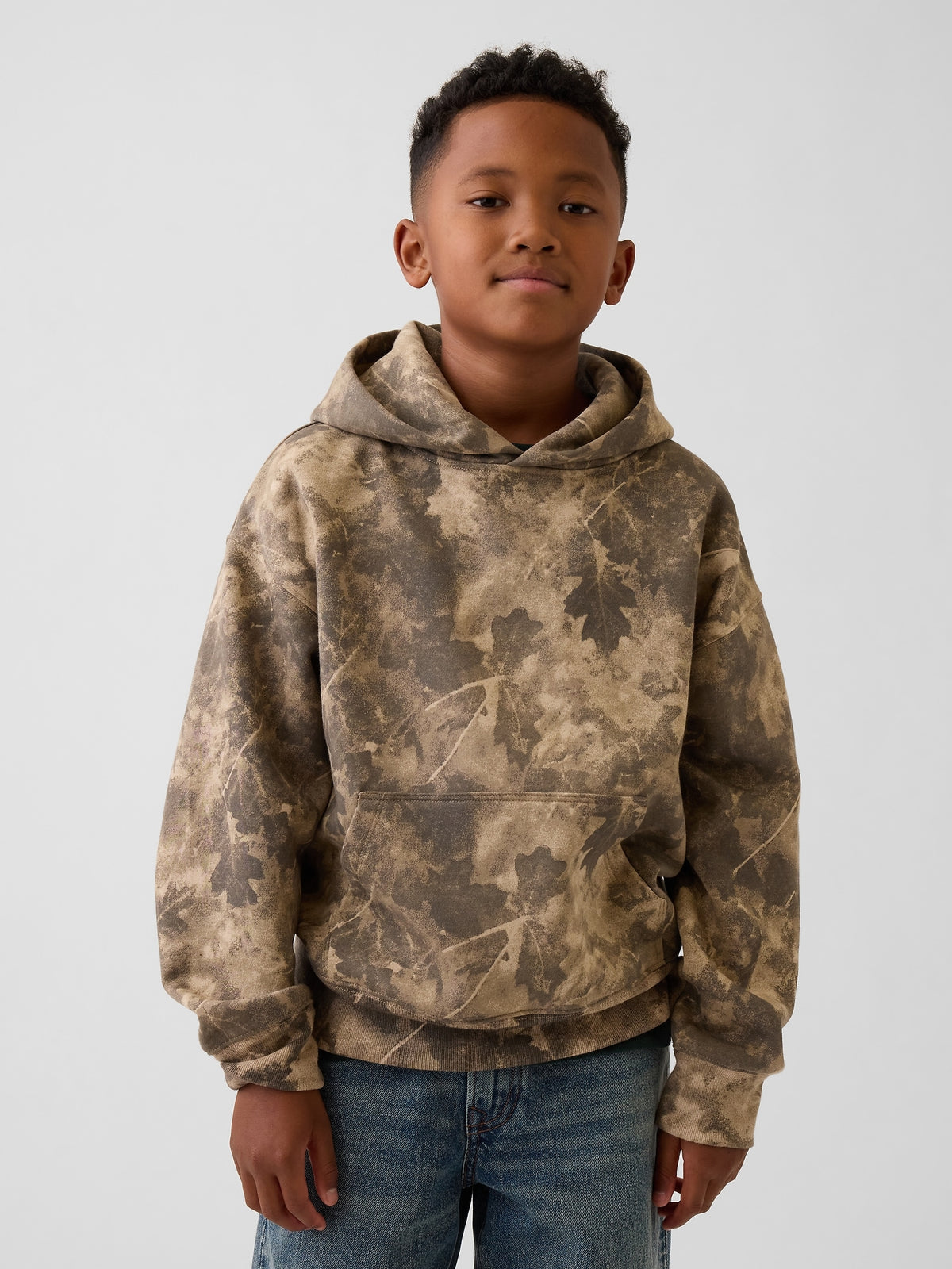 Gap Kids VintageSoft Relaxed Hoodie in Light camo, front view on a child model