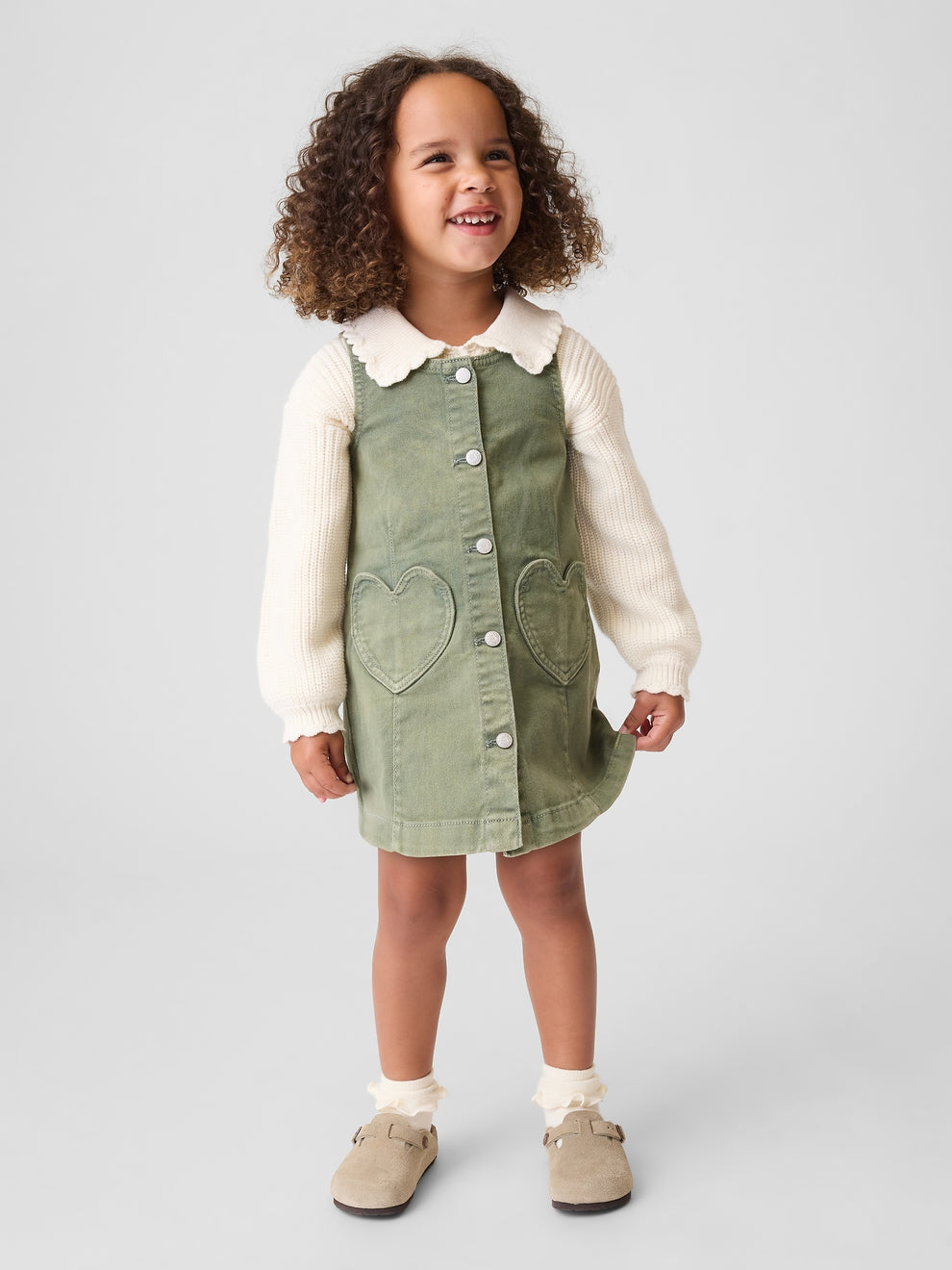Gap Baby & Toddler Denim Heart Pocket Shift Dress in sage, front view on a child model