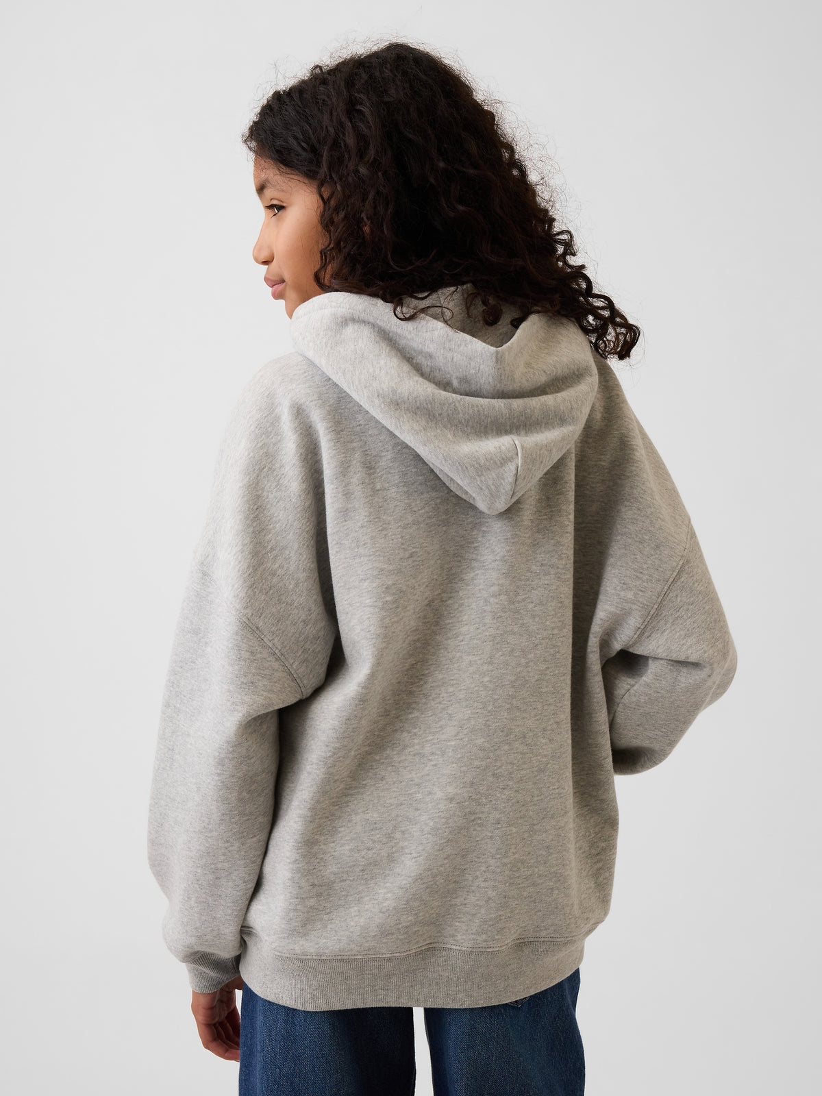 Gap Kids VintageSoft Oversized Logo Hoodie in Grey, back view on a child model