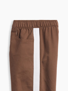 Gap Baby & Toddler UltraSoft Pull-On Stripe Barrel Pants in Amber wood, side stripe and pocket detail