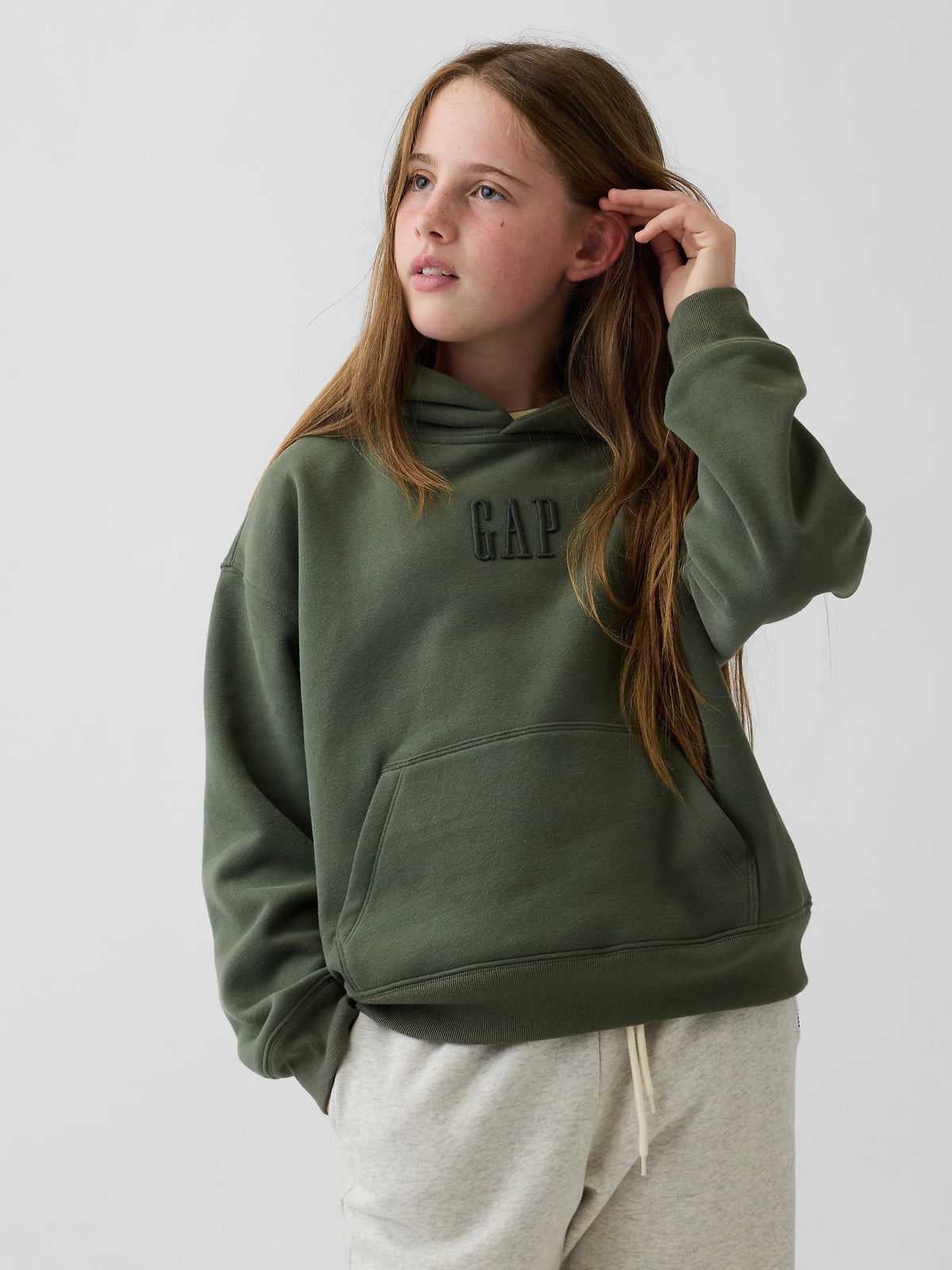 Gap Kids VintageSoft Relaxed Logo Hoodie in Tweed green, front view on a child model