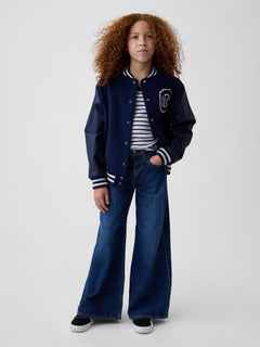 Gap Kids Low Rise Front Yoke Baggy Jeans in Dark wash, full-length view on a child model