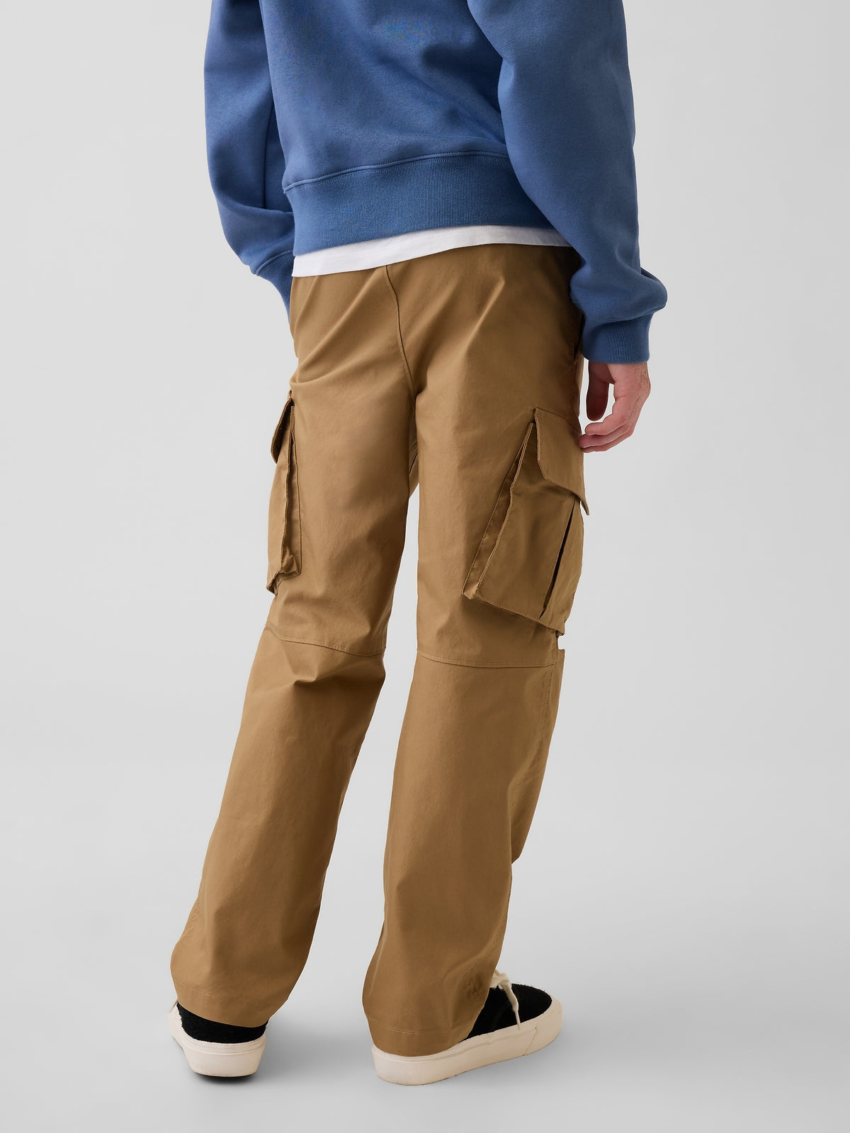 Gap Kids Quick-Dry Easy Cargo Pants in Mission tan, back view on a child model