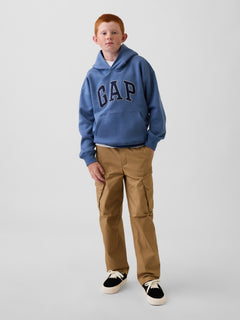 Gap Kids Quick-Dry Easy Cargo Pants in Mission tan, full-length view on a child model