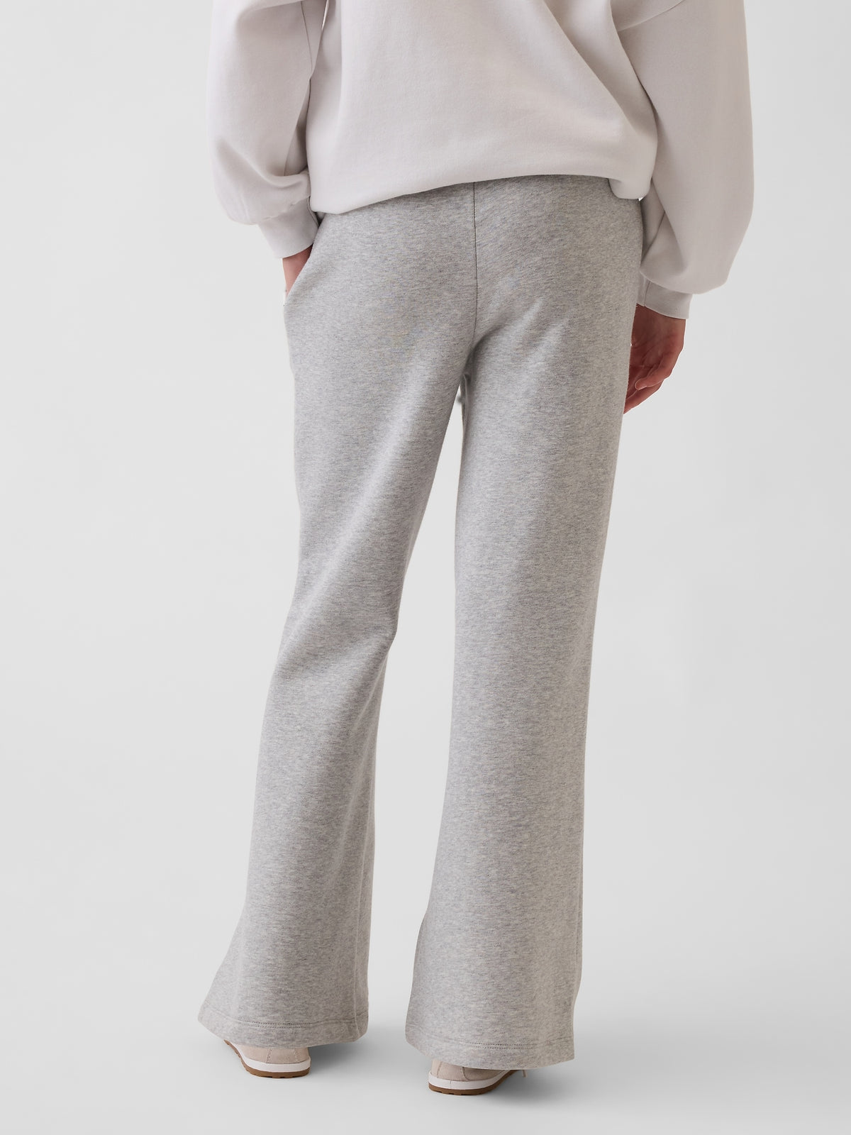 Gap Kids VintageSoft Relaxed Flare Sweatpants in Grey, back view on a child model