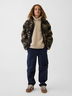 Gap Kids VintageSoft Relaxed Logo Hoodie in Bedrock, full-length view on a child model