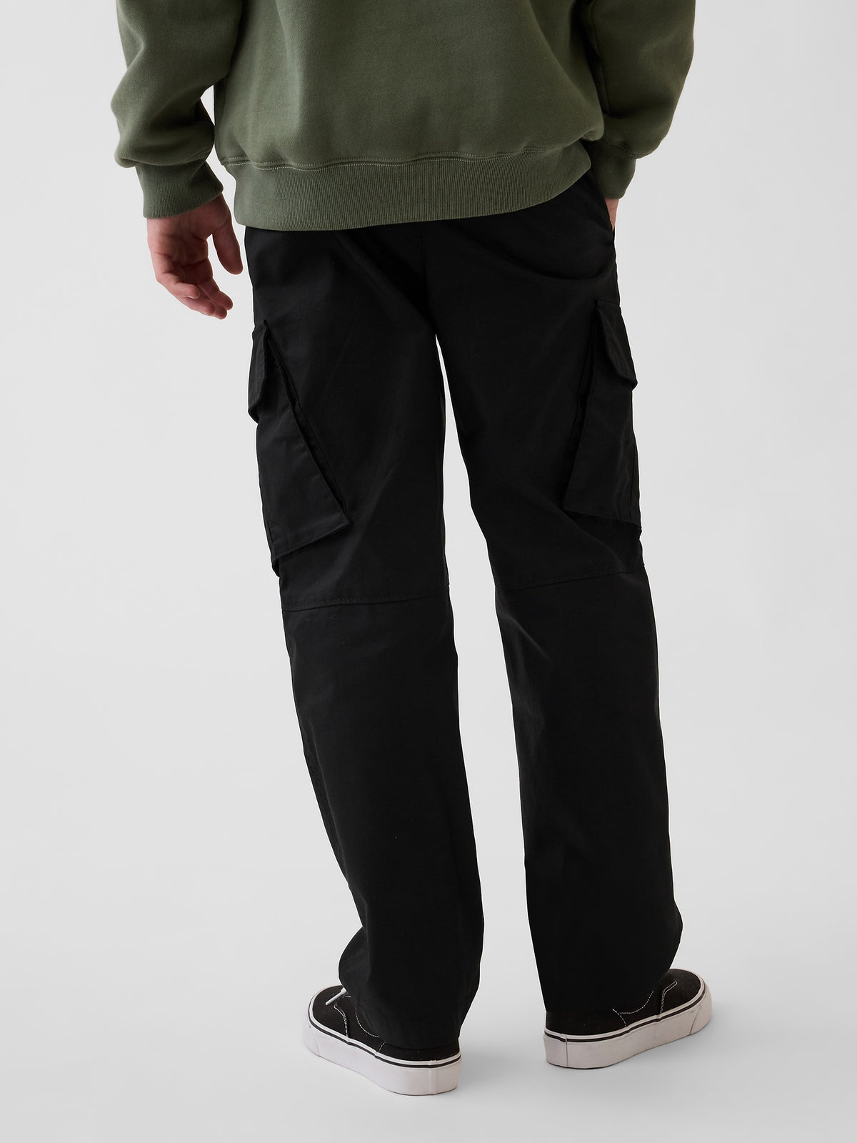 Gap Kids Quick-Dry Easy Cargo Pants in Black, back view on a child model