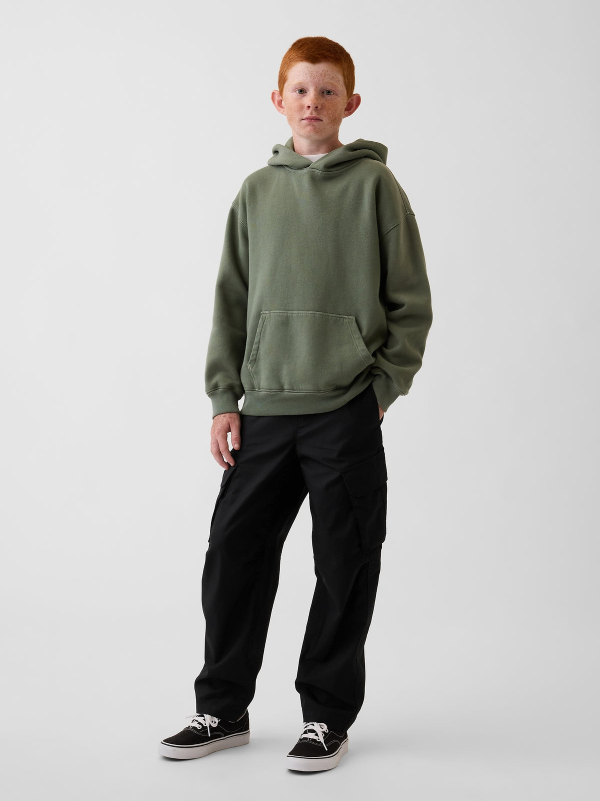 Gap Kids Quick-Dry Easy Cargo Pants in Black, full-length view on a child model