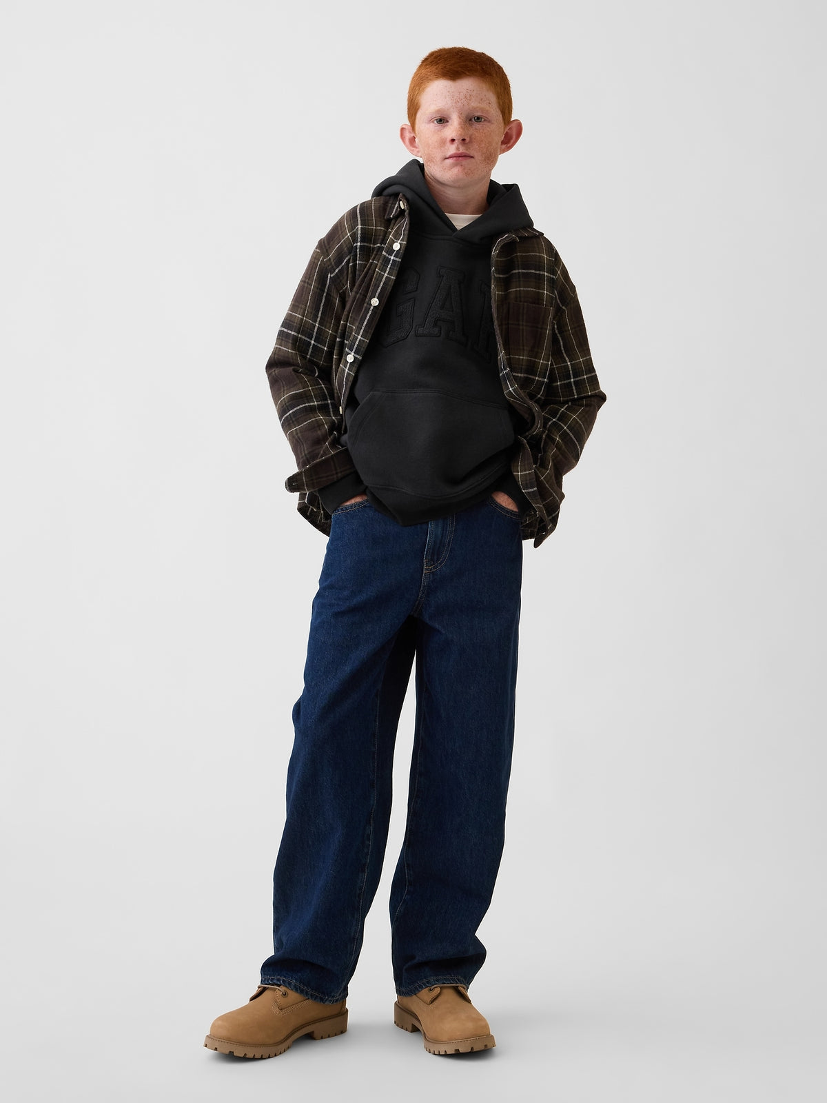 Gap Kids VintageSoft Relaxed Logo Hoodie in Moonless night, full-length view on a child model