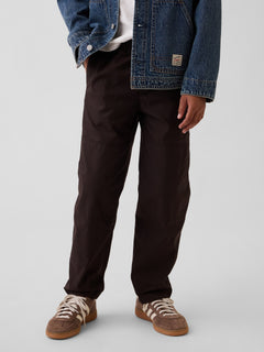 Gap Kids Double-Knee Quick-Dry Pants in Terra brown, front view on a child model
