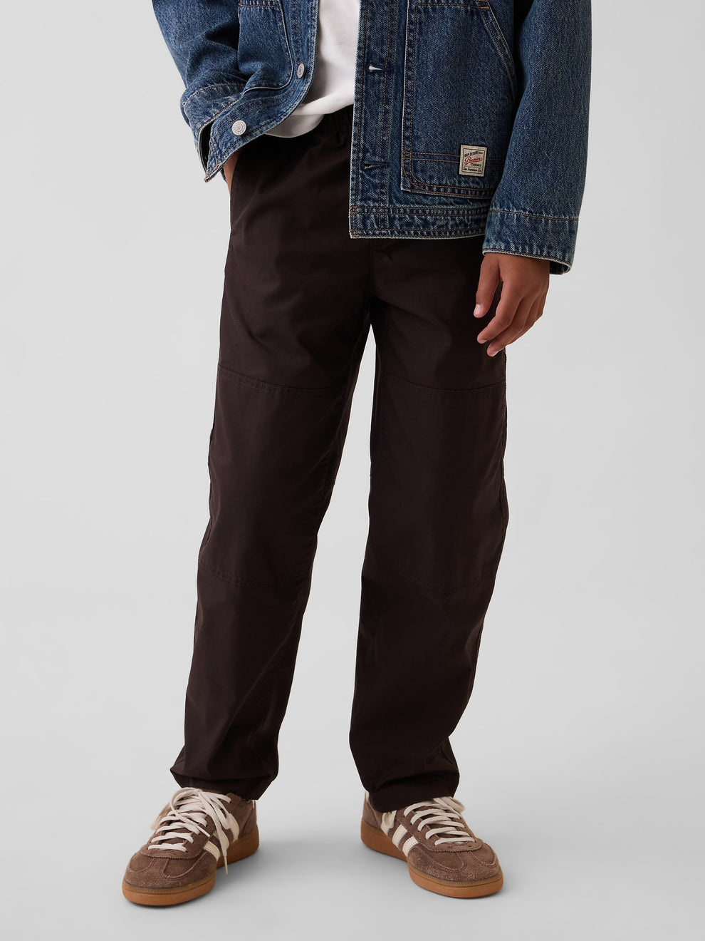 Gap Kids Double-Knee Quick-Dry Pants in Terra brown, front view on a child model