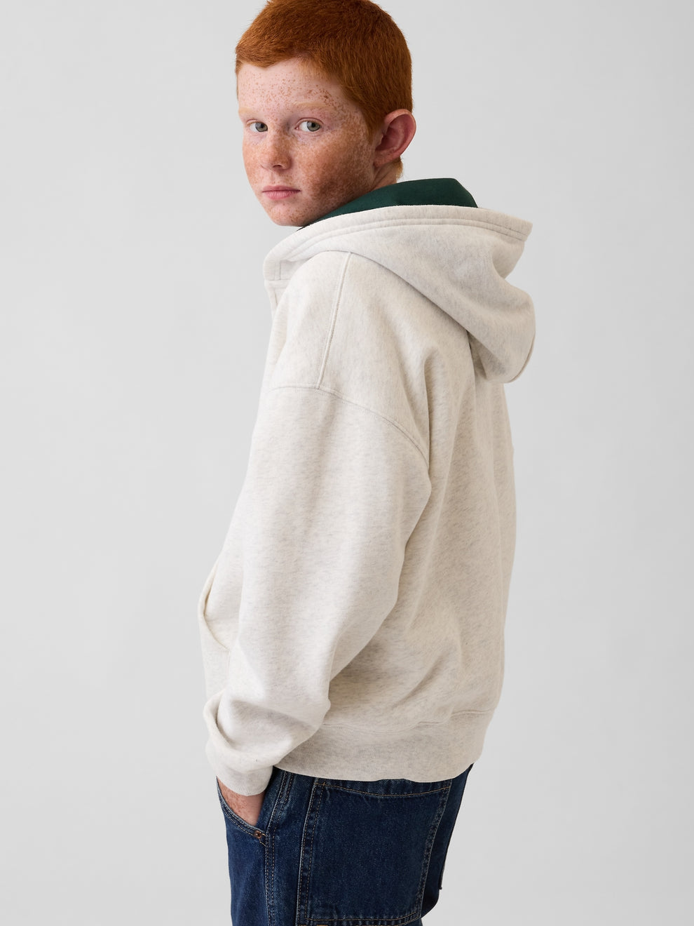 Gap Kids VintageSoft Logo Zip Hoodie in Pale heather grey, back view on a child model