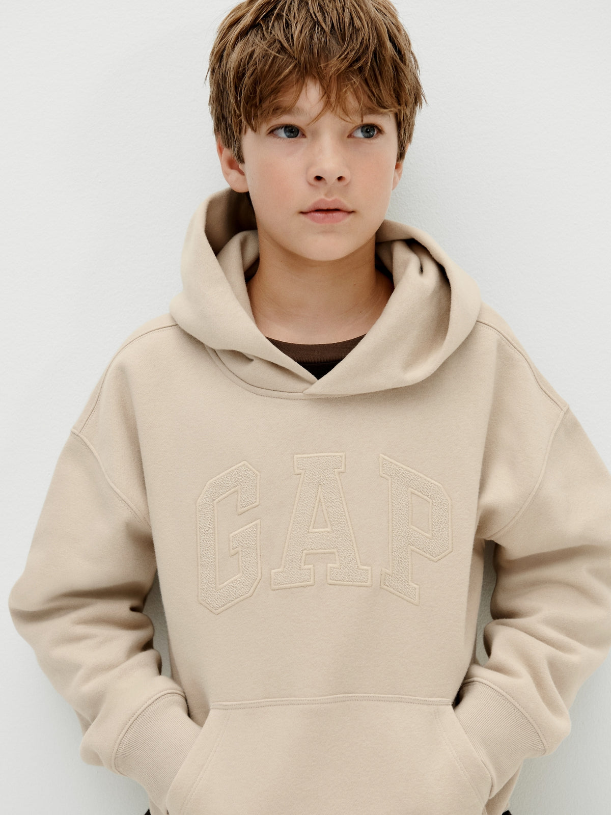Gap Kids VintageSoft Relaxed Logo Hoodie in Bedrock, front view on a child model