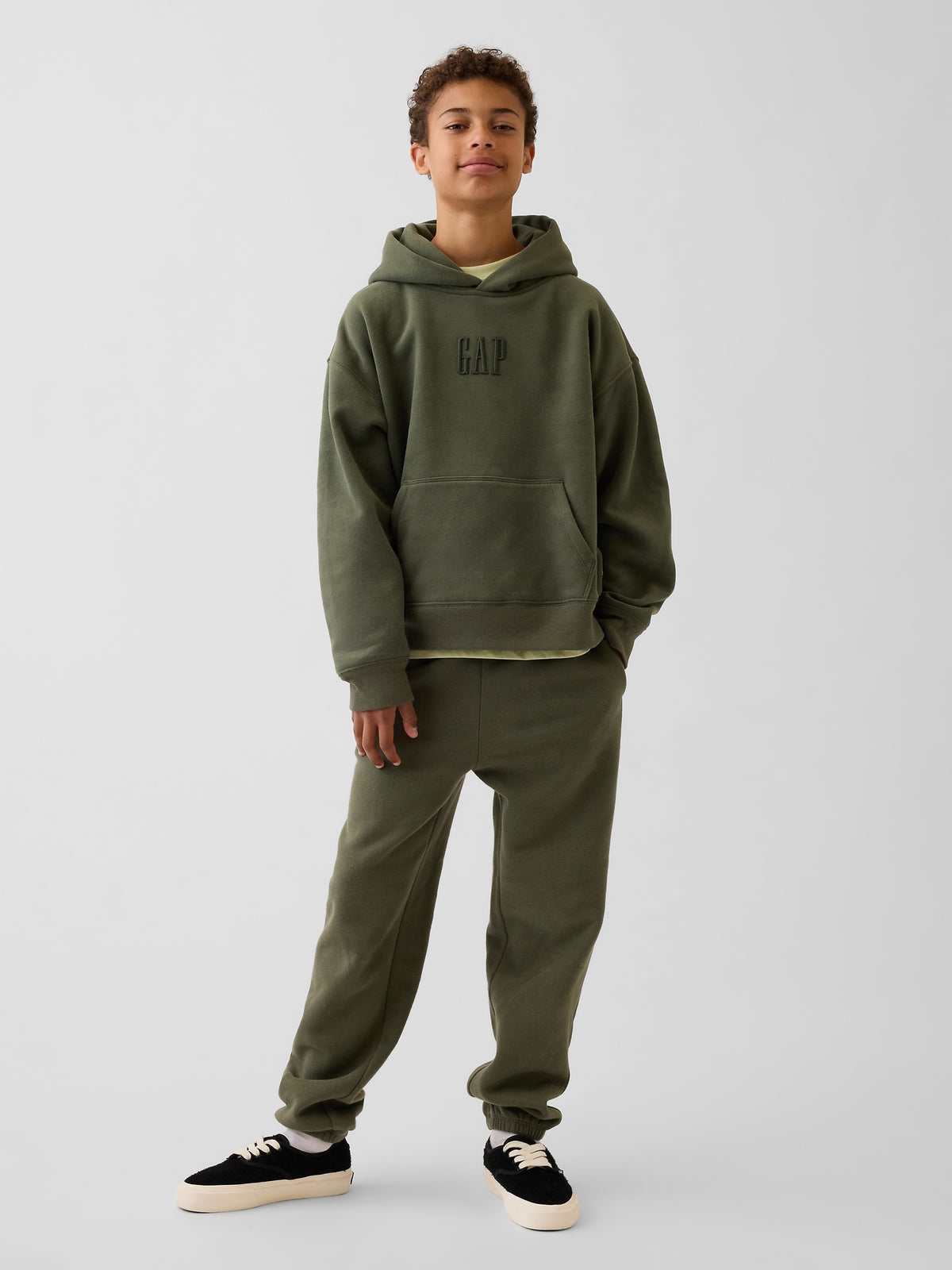 Gap Kids VintageSoft Relaxed Logo Hoodie in Tweed green, full-length view on a child model