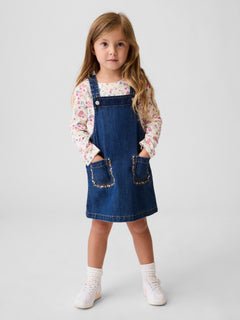 Gap Baby & Toddler Embroidered Denim Skirtall in Medium wash, full-length view on a child model