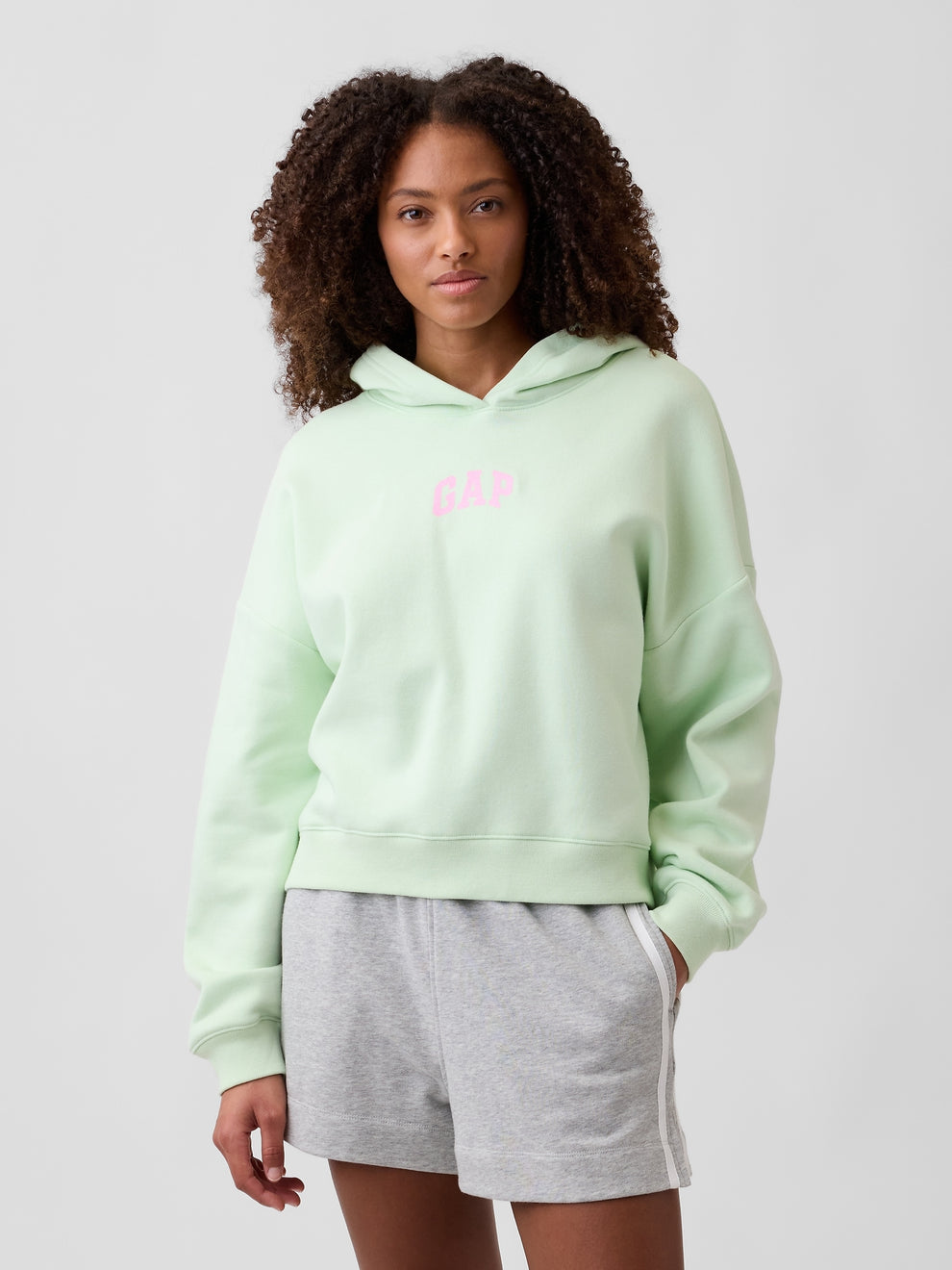 Relaxed Gap Mini-Logo Cropped Hoodie in Pod green, front view on a model