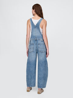 Gap UltraSoft Denim Horseshoe Overalls in Medium indigo, back view on a model