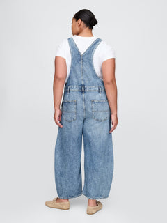 Gap UltraSoft Denim Horseshoe Overalls in Medium indigo, back view on a model