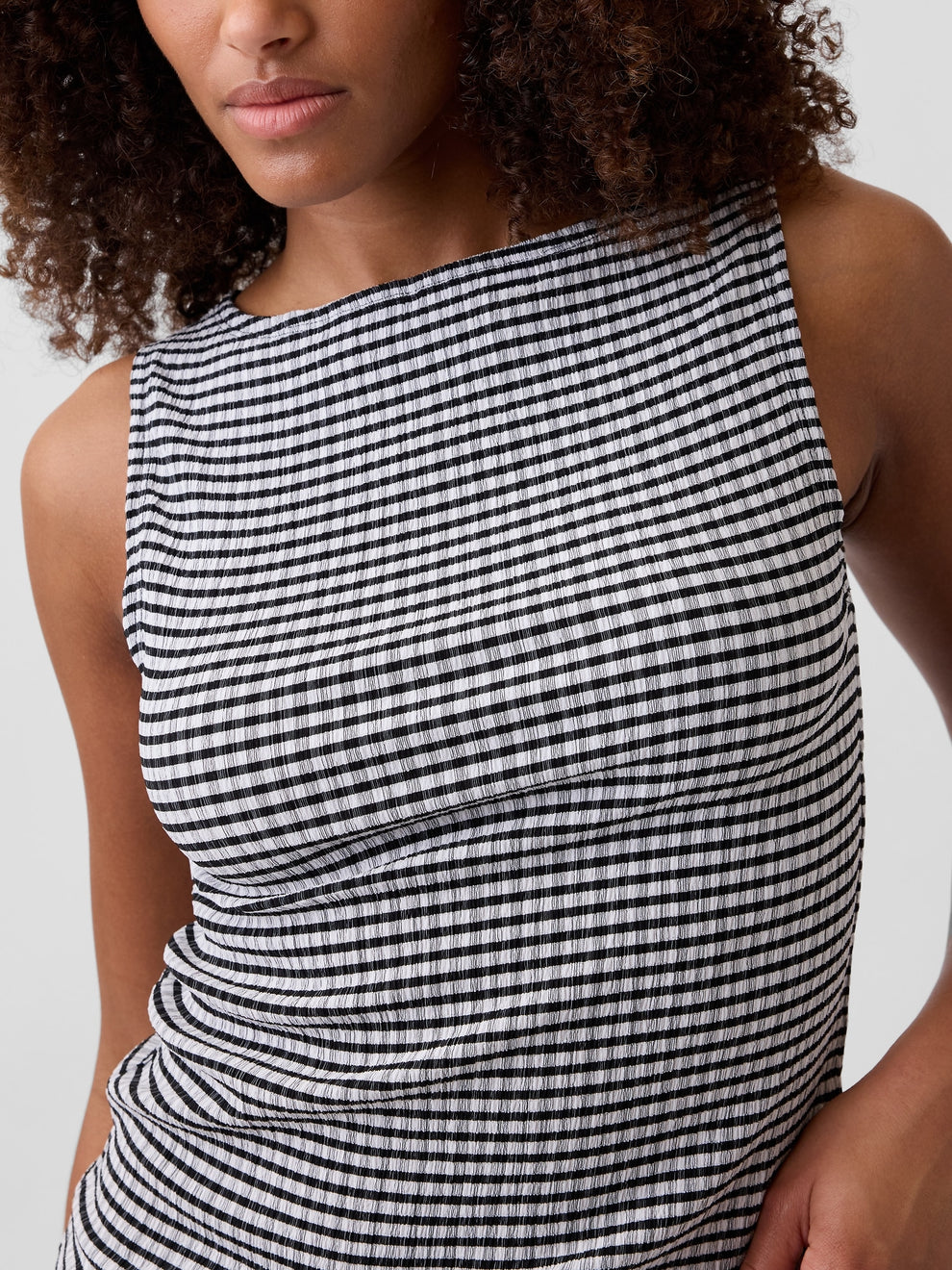 Gap Boatneck Tank Top in black and white gingham, neckline detail on a model