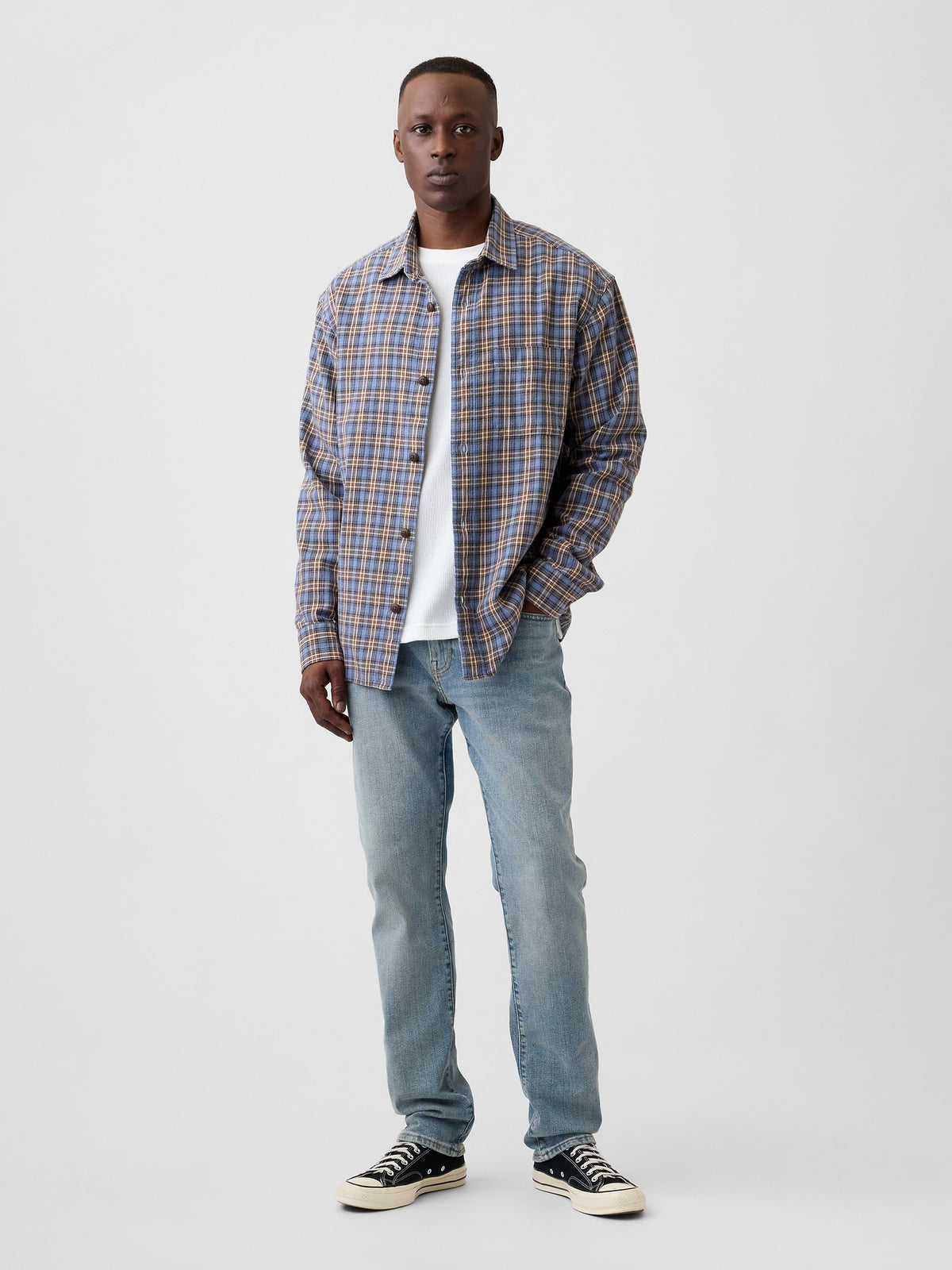 Gap Slim Jeans in Medium wash, full-length view on a model