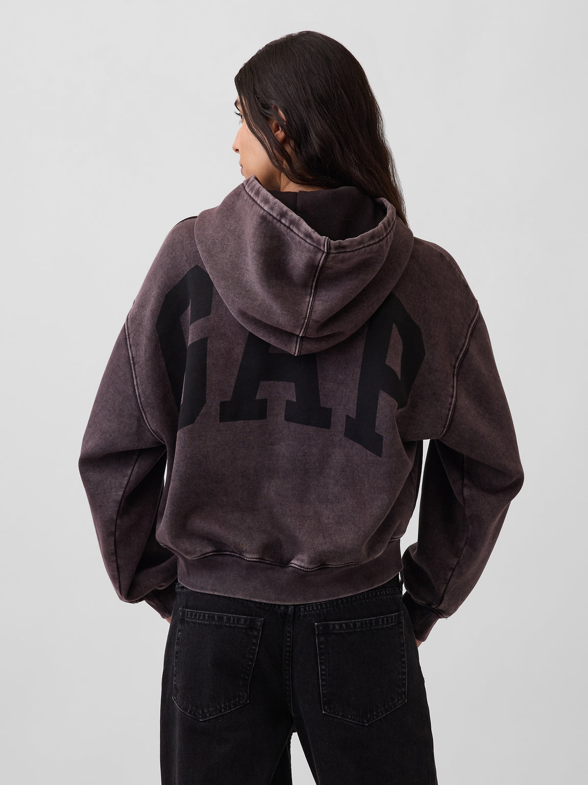 Gap VintageSoft Crop Logo Hoodie in Moonless night, back view on a model