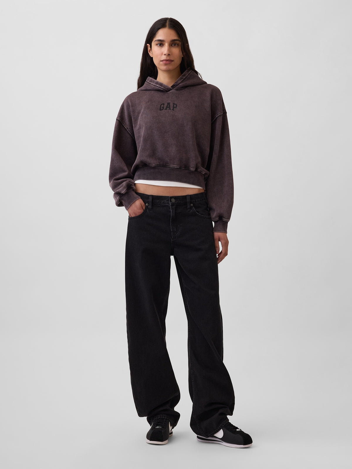Gap VintageSoft Crop Logo Hoodie in Moonless night, full-length view on a model