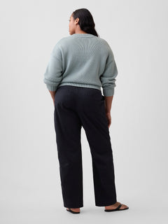 Gap Mid Rise Easy Barrel Khakis in Black moonless night, back view on a model