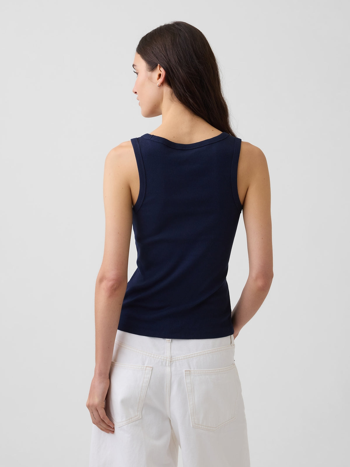 Rib Gap Logo Tank Top in dark night, back view on a model