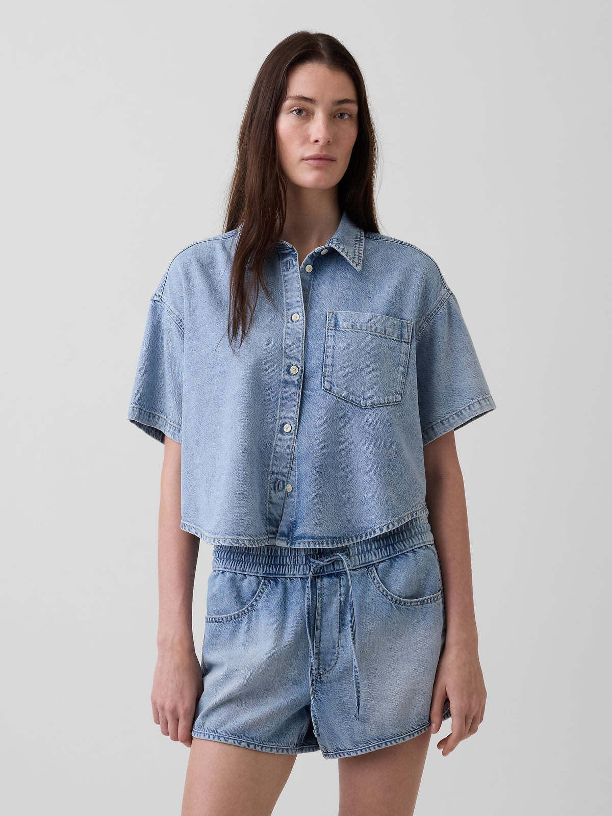Gap UltraSoft Denim Oversized Camp Shirt in Light wash, front view on a model