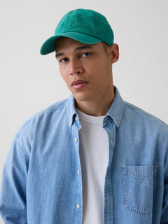 Gap Washed Logo Baseball Hat in Baize green, front view worn by a model