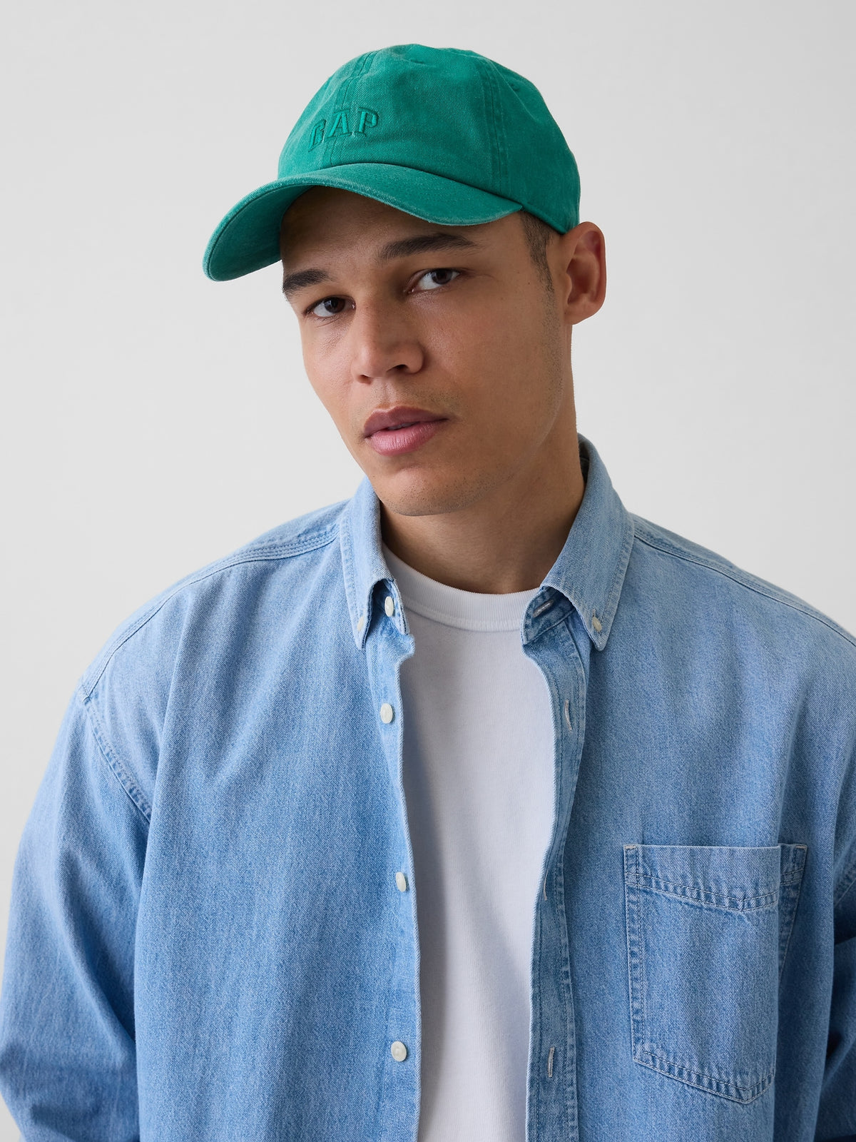 Gap Washed Logo Baseball Hat in Baize green, front view worn by a model