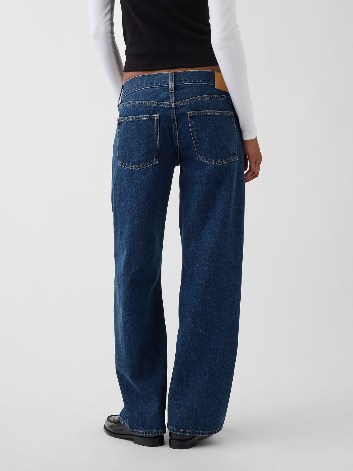 Gap The Hailey Low Rise Loose Jean in Medium Indigo, back view on a model