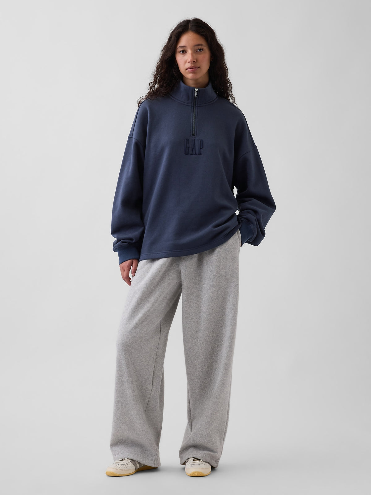 Gap Heavyweight Oversized Logo Quarter-Zip Pullover in Vintage navy blue, full-length view on a model