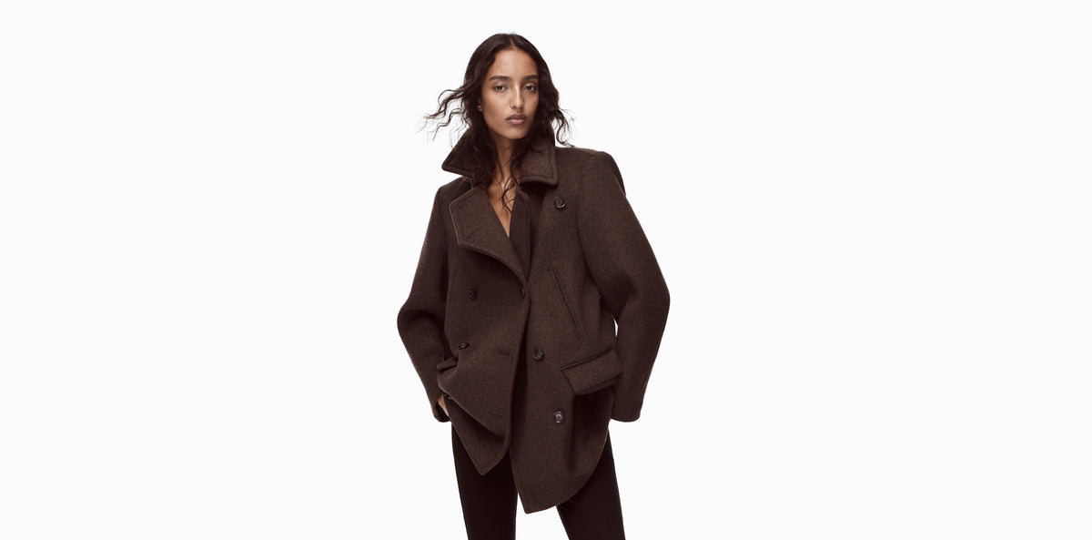 Gap × Victoria Beckham: model in a long coat.